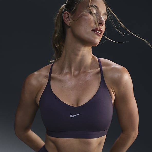 Purple Racerback Sports Bras. Nike CA